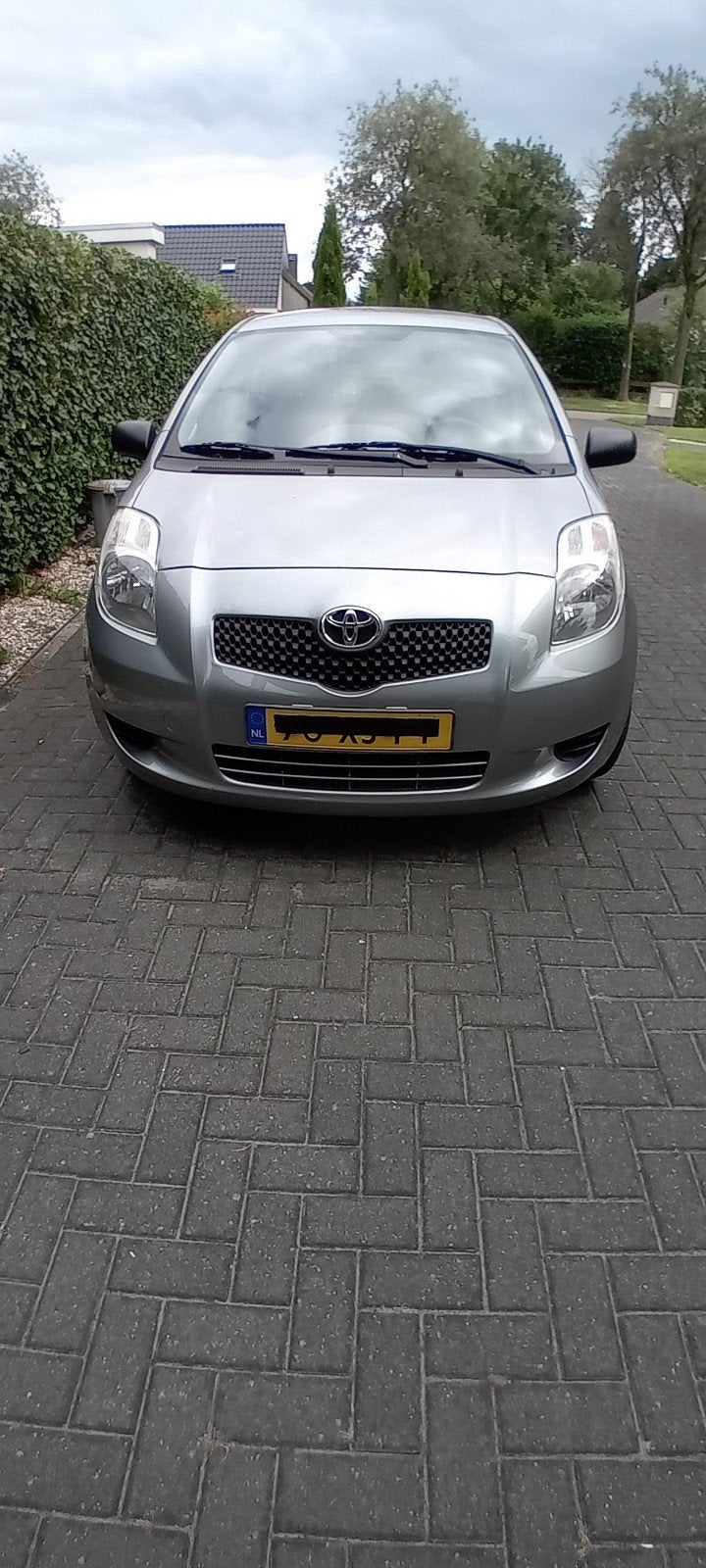 Toyota Yaris 1.3 16V Vvt-i 5DR 2007 Grijs, Auto's, Voorwielaandrijving, 40 €/maand, 4 cilinders, Origineel Nederlands