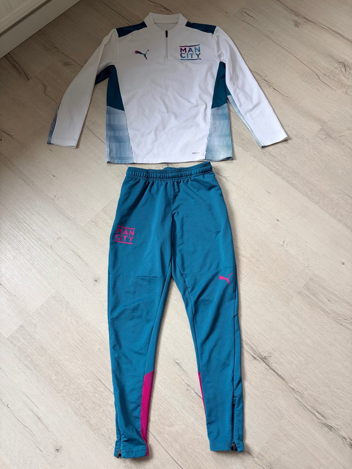 Puma Manchester City trainingspak maat 158, Ophalen of Verzenden, Zo goed als nieuw, Jongen, Setje
