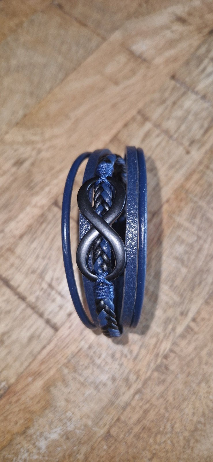 Leren armband met oneindigheidsteken  21cm, Sieraden, Tassen en Uiterlijk, Armbanden, Ophalen of Verzenden, Nieuw, Blauw, Leer