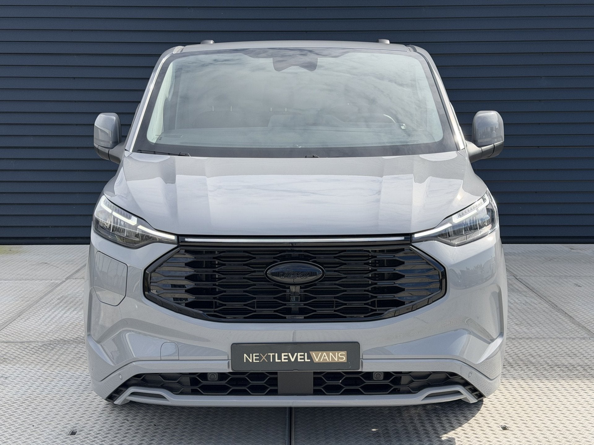 Ford E-Transit Cust. 340 L2H1 Sport 71 kWh | Next Level Edit, Auto's, Automaat, Automatische klimaatregeling, Achterwielaandrijving