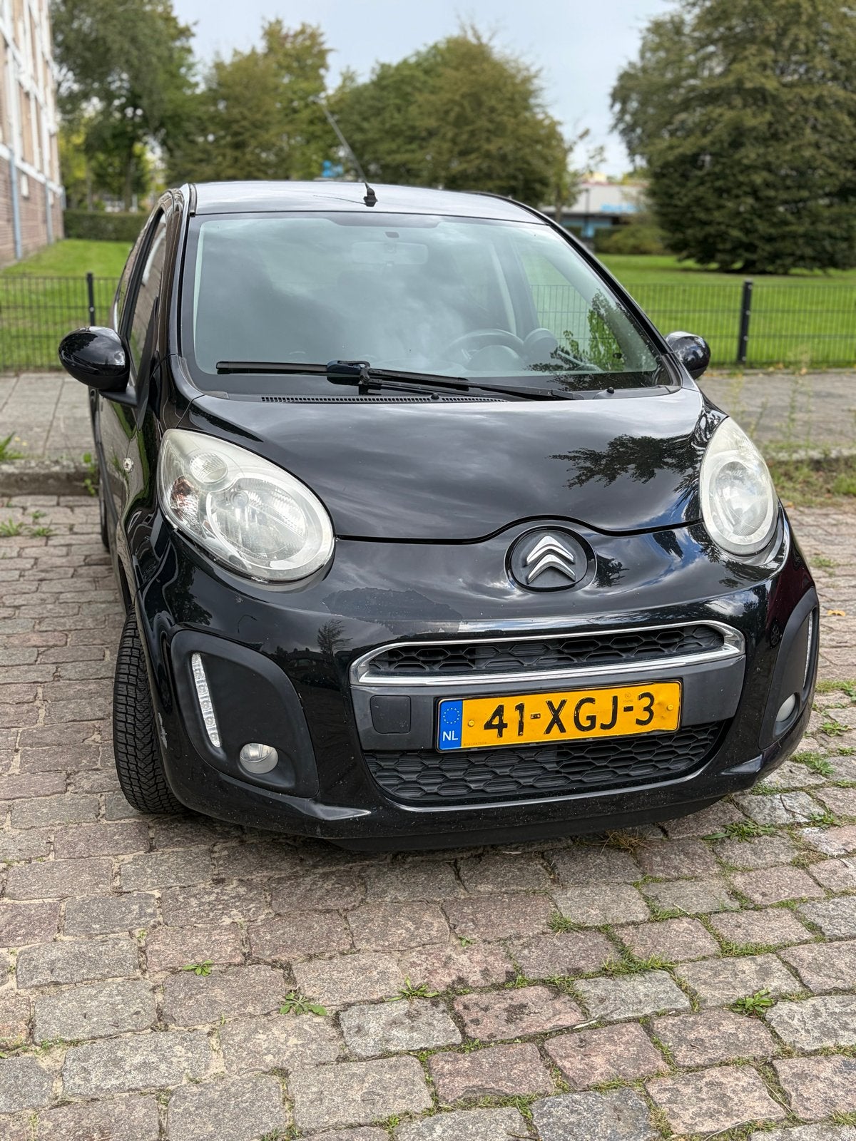 Citroën C1 1.0i 68PK 5D 2012 Zwart, Auto's, Voorwielaandrijving, Stof, Zwart, C1