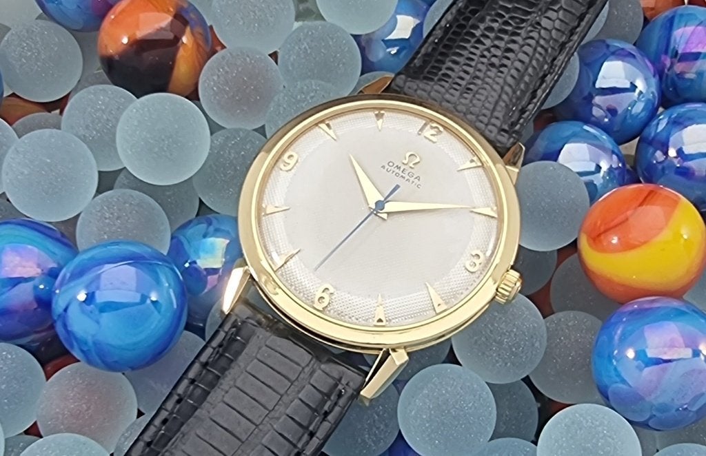 Omega 2710 Bumper 18 kt van 1952 cal 354 Honeycomb dial, Ophalen, Polshorloge, 1930 tot 1960, Omega
