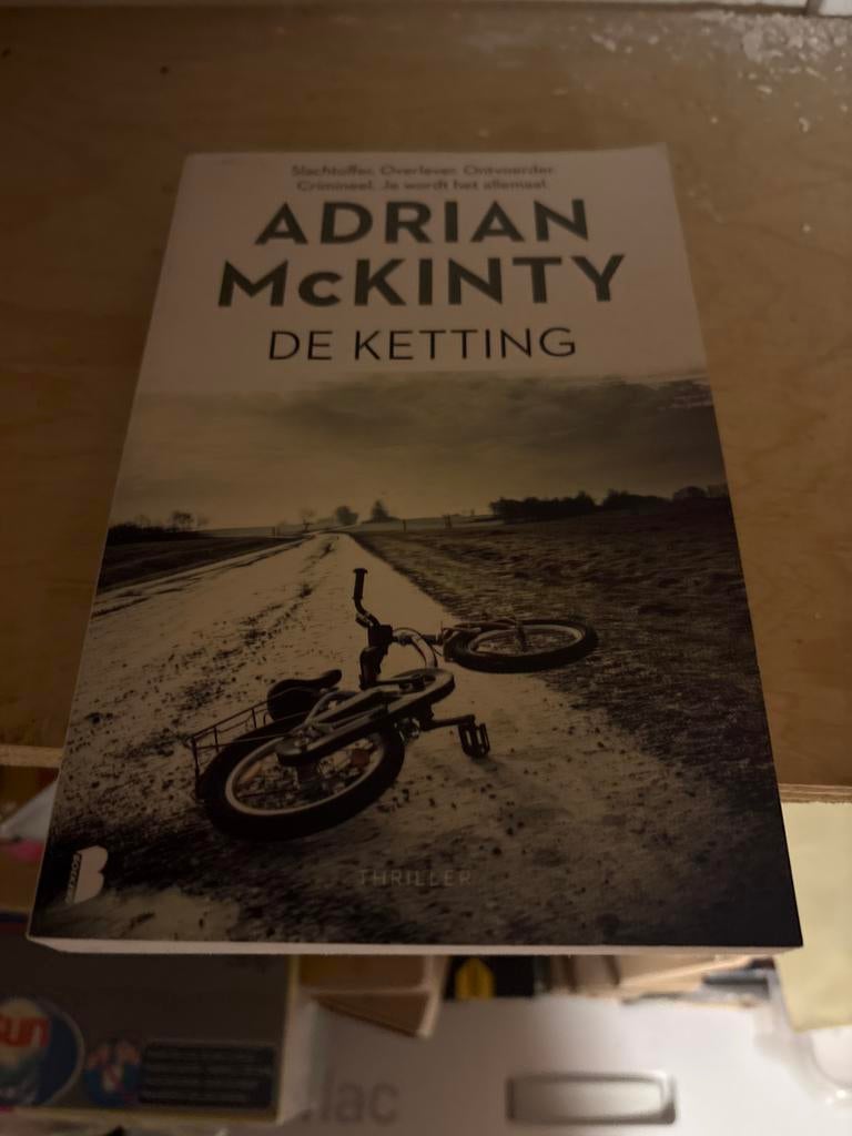 Adrian McKinty - De Ketting (Thriller), Boeken, Thrillers, Gelezen, Europa overig, Ophalen of Verzenden