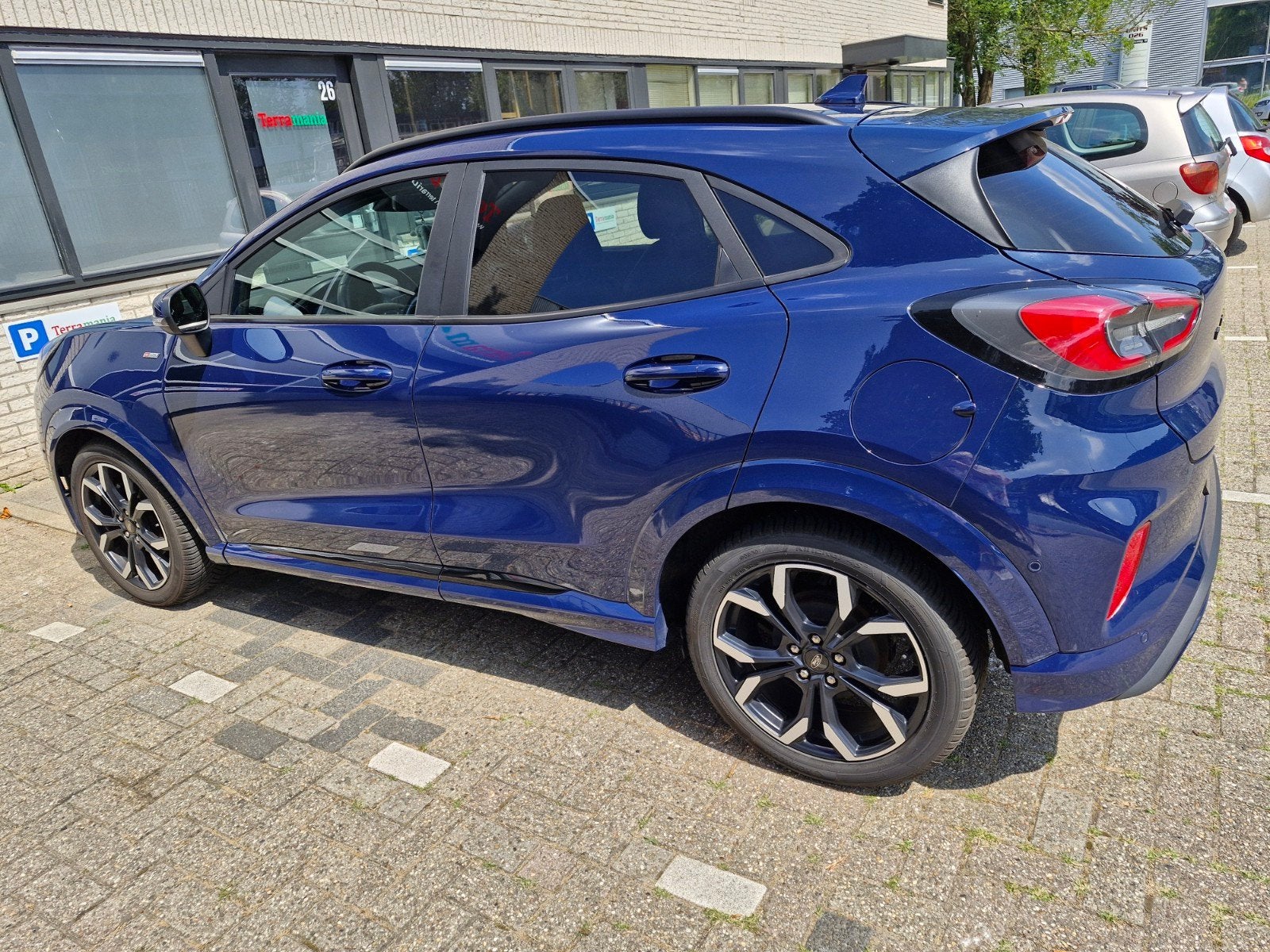 Ford Puma 1.0i Ecoboost Hybrid 125pk 2021 Blauw, Auto's, Ford, Puma, Blauw, Leder en Stof, 665 kg