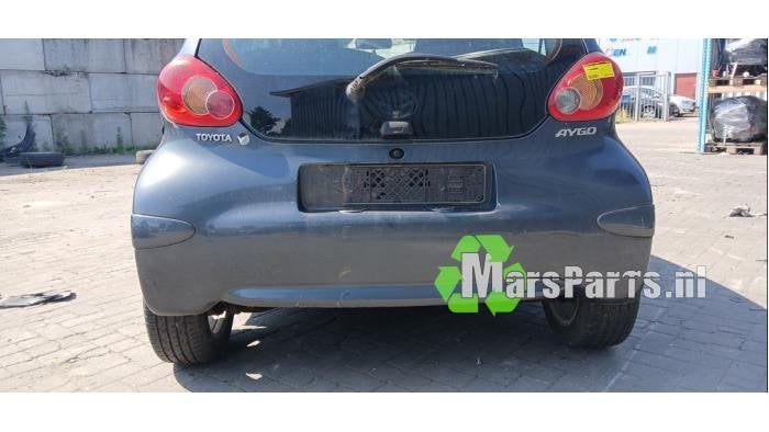 Achterbumper van een Toyota Aygo, Auto-onderdelen, Carrosserie en Plaatwerk, Gebruikt, -, -, Ophalen of Verzenden
