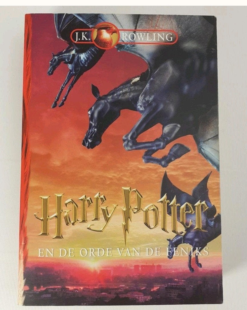 Harry Potter en de Orde van de Feniks - J.K. Rowling, Ophalen of Verzenden, Gelezen, J.K. Rowling