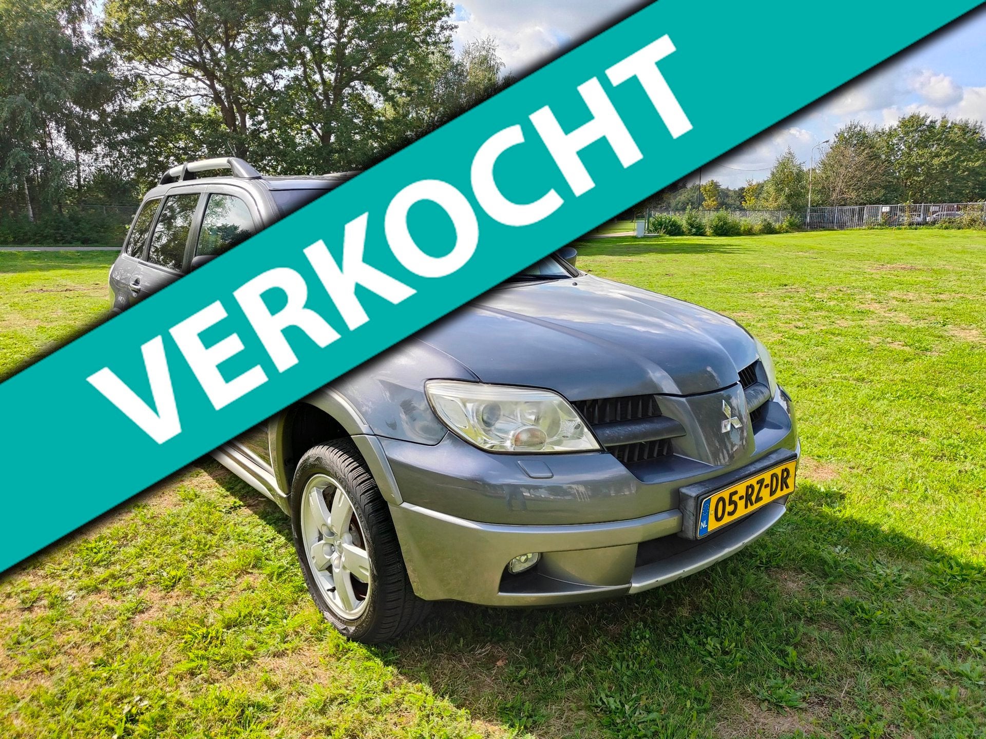 Mitsubishi Outlander 2.4 Instyle 4WD, Auto's, Automaat, Zwart, 4 cilinders, Bedrijf