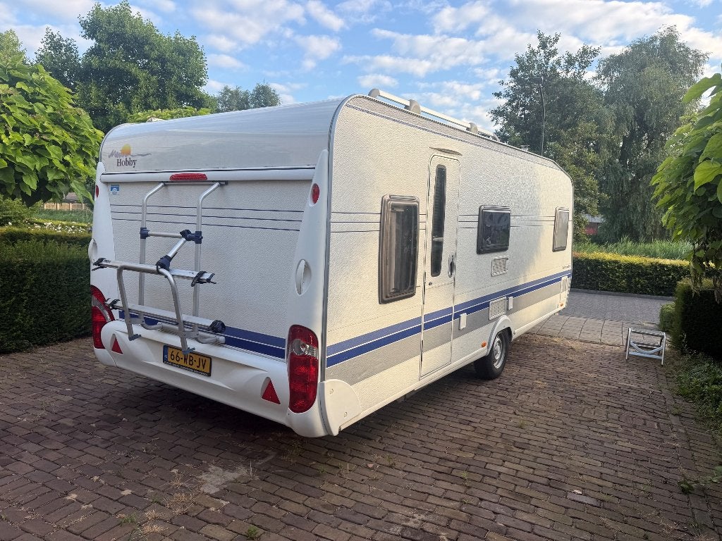 Caravan Hobby 560 KMFe  BY2008, Caravans en Kamperen, Luifel, Vast bed, Rondzit, Hobby