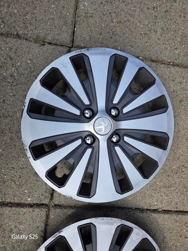 Gezocht 2 stuks Wieldoppen Peugeot 16 inch - Set van 2, Auto diversen, Ophalen of Verzenden, Gebruikt
