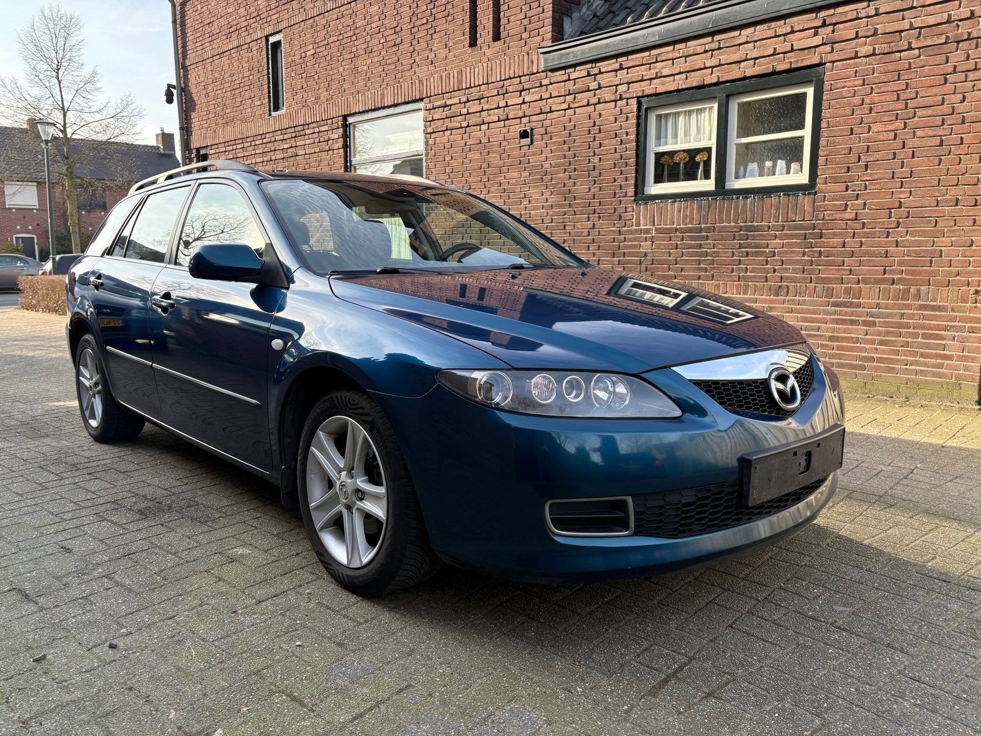 Mazda 6 Sportbreak 1.8i Touring, Auto's, Stof, Gebruikt, 4 cilinders, Origineel Nederlands