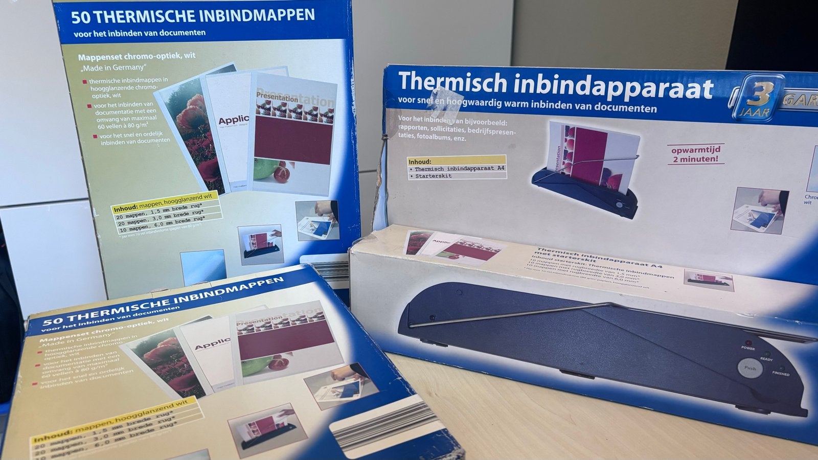 Thermisch inbindapparaat A4 met inbindmappen, Ophalen