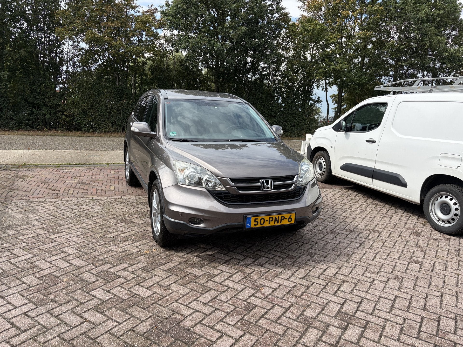 Honda CR-V 2.0i Elegance TREKHAAK STOELVERWARMING PDC, Auto's, Automatische klimaatregeling, Euro 5, Gebruikt, Zwart
