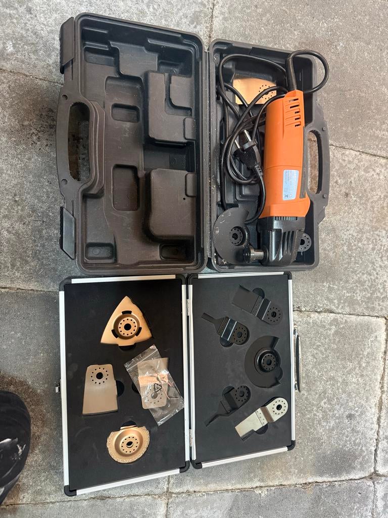 Multitool met accessoires in koffer, Ophalen, Gebruikt
