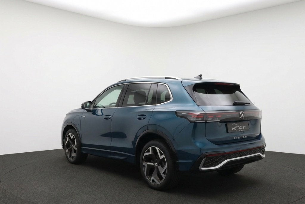 Volkswagen Tiguan 1.5 TSI eHybrid PHEV R-Line Pano l Leder l, Auto's, Automaat, 4 cilinders, Blauw, Bedrijf
