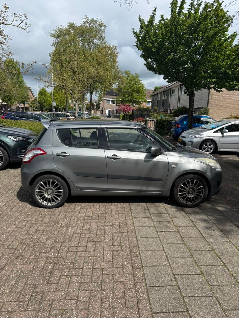 Suzuki Swift 1.2 5-Deurs 2011 Grijs, Auto's, Suzuki, Voorwielaandrijving, 4 cilinders, 400 kg, Swift