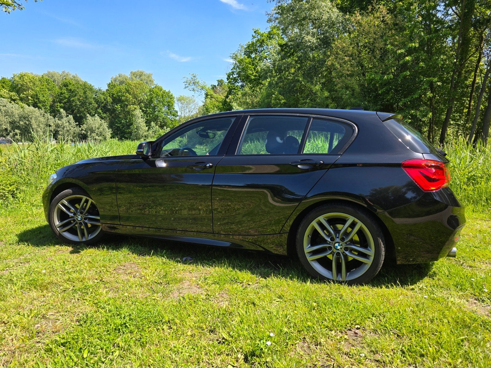 BMW 1-Serie 118i 136pk Aut 2017 Zwart, Auto's, BMW, 1295 kg, Zwart, Origineel Nederlands, 650 kg