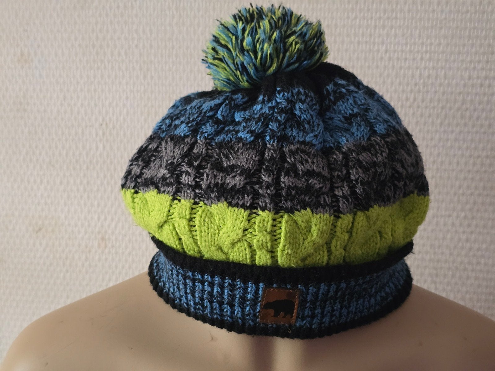 Kinder gebreide muts met pompon en fleece voering, Jongen of Meisje, Ophalen of Verzenden, Zo goed als nieuw, Onbekend
