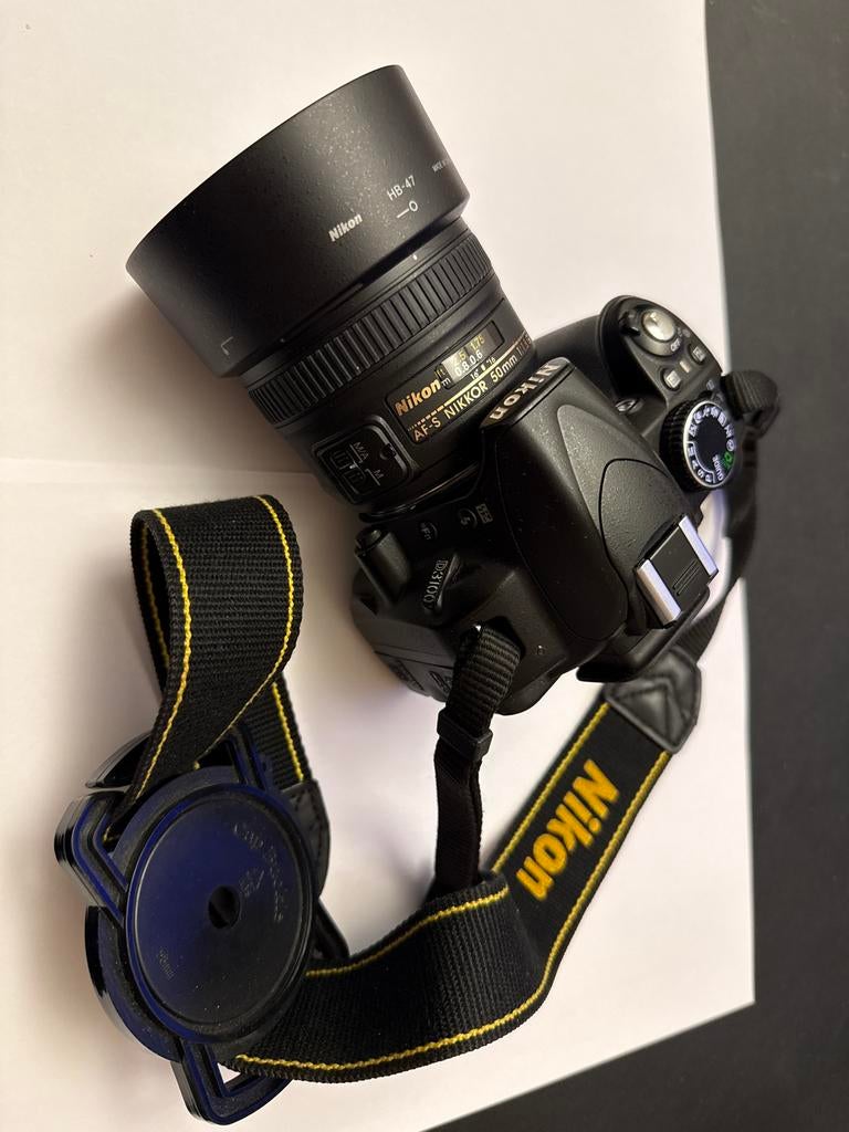 Nikon D3100 met AF-S NIKKOR 50mm 1:1.8G lens, Gebruikt, Spiegelreflex, Ophalen of Verzenden, Nikon