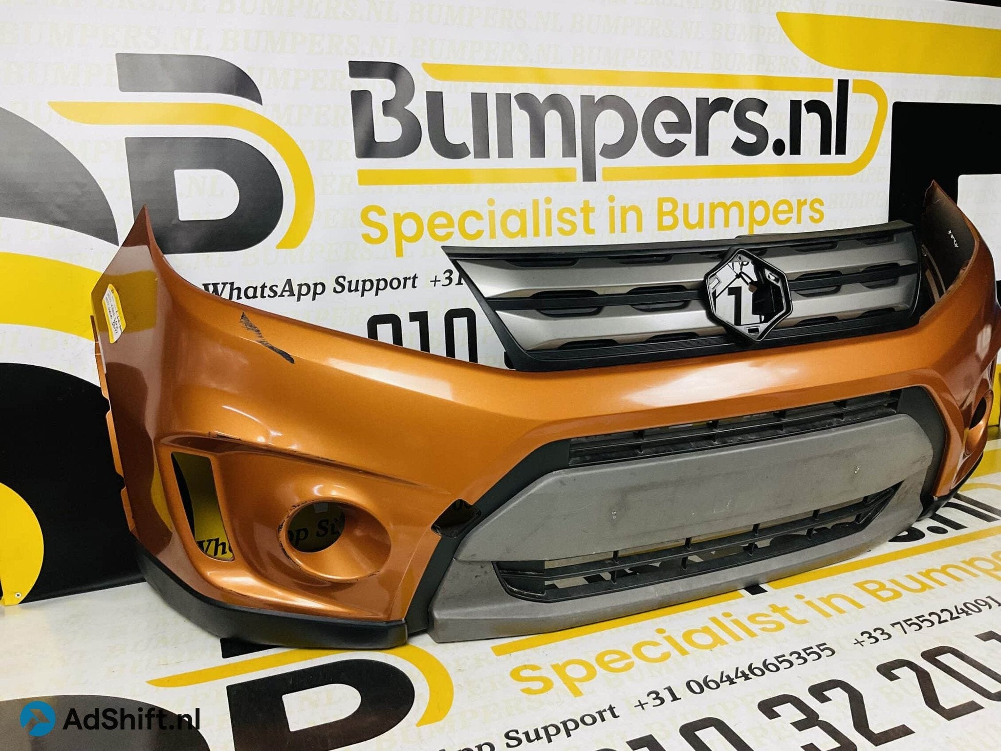 Bumper Suzuki Vitara + Grill Voorbumper 2-E10-3041, Auto-onderdelen, Bumper
