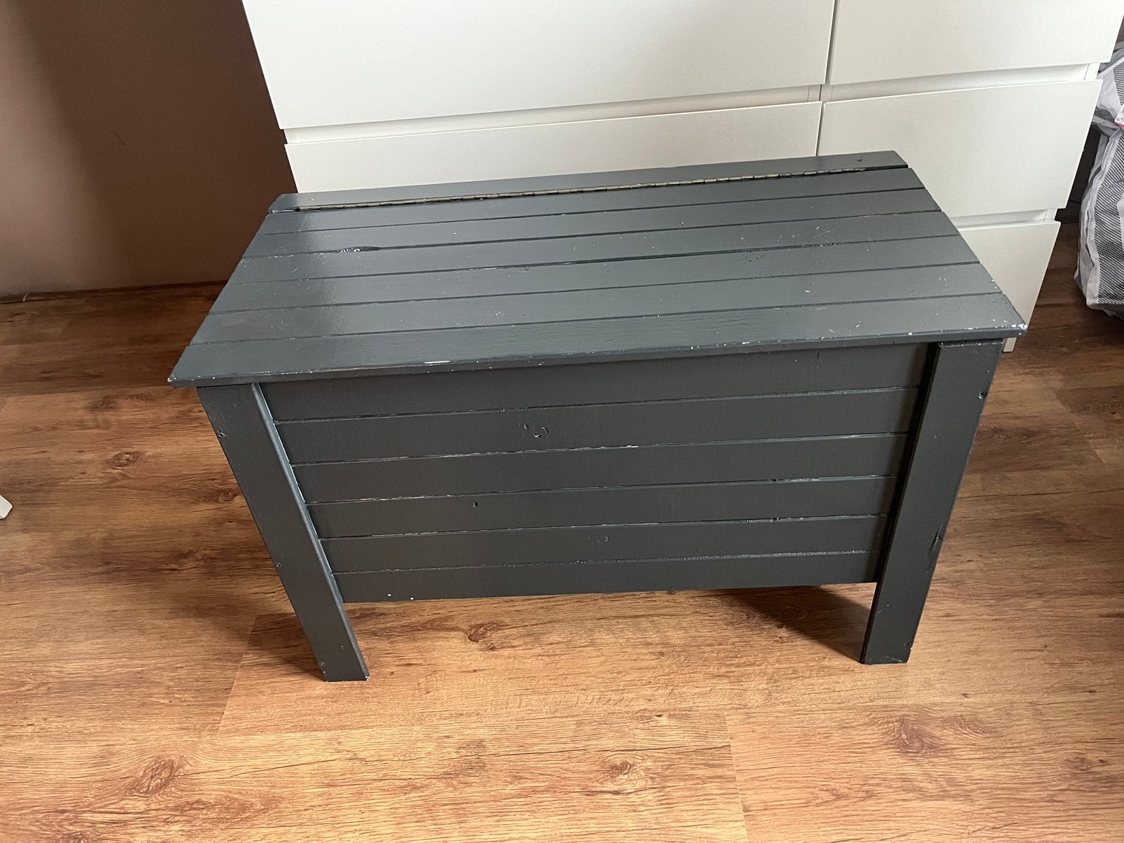Houten speelgoed kist, Ophalen