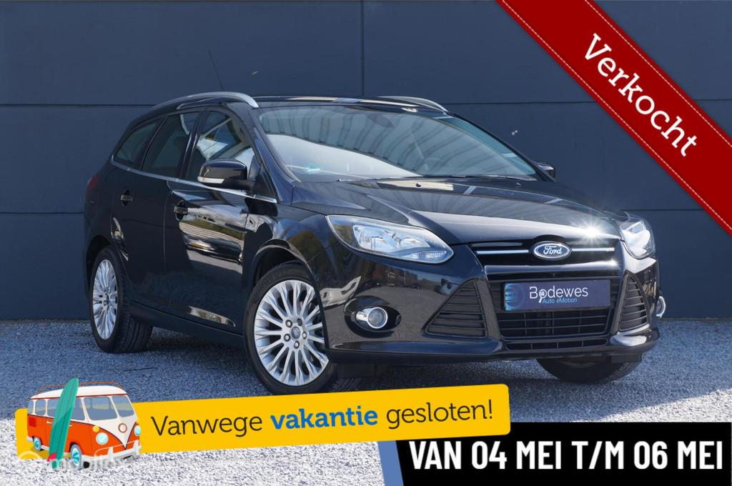 Ford Focus Wagon 1.6 TI-VCT Titanium met lage km stand, Auto's, Gebruikt, Zwart, 4 cilinders, Zwart