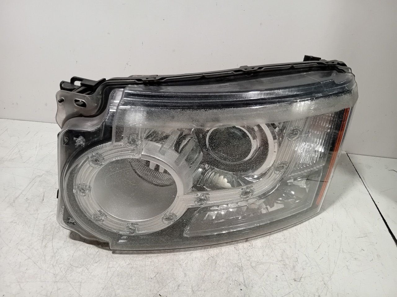 Koplamp links Land Rover Discovery, Auto-onderdelen, Verlichting, Onderdelen@venauto.nl, Van der Ven Autorecycling B.V., Ettenseweg 76, 4706 PB Roosendaal, The Netherlands