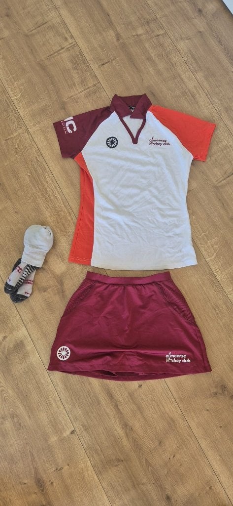 Hockey tenue meisje AC Almeerse hockeyvereniging, Sport en Fitness, Hockey, Ophalen, Zo goed als nieuw, Kleding