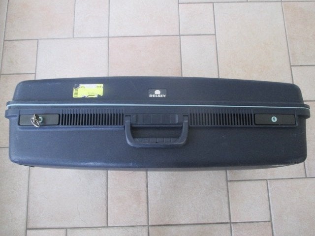 Te koop : Delsey koffer / kleur donkerblauw., Gebruikt, Hard kunststof, Minder dan 50 cm, 55 cm of meer