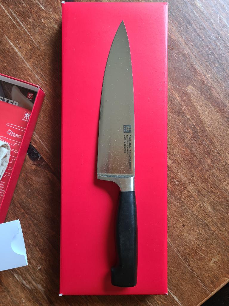 Zwilling knife ****four star 200mm, new, Huis en Inrichting, Keuken | Bestek, Ophalen of Verzenden, Nieuw, Rvs of Chroom, Los bestek