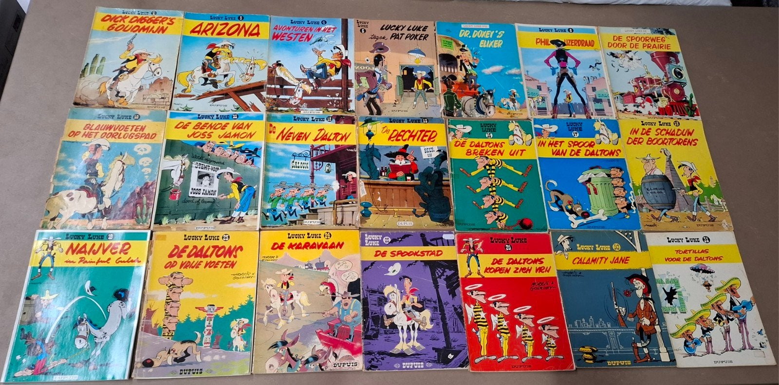 21 x Lucky Luke stripboeken / uitgeverij Dupuis, Meerdere stripboeken, Ophalen of Verzenden, Gelezen, Morris & Goscinny