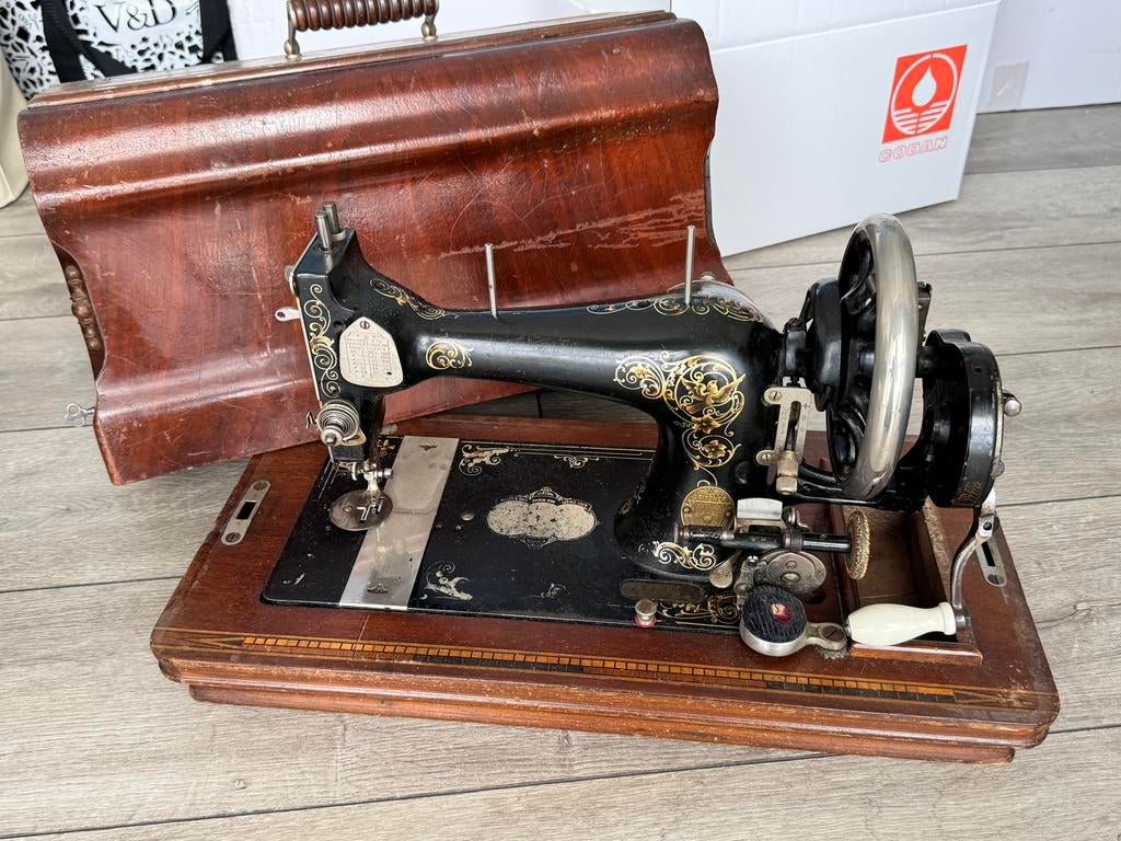 Antieke Gritzner naaimachine met houten deksel, Antiek en Kunst, Ophalen