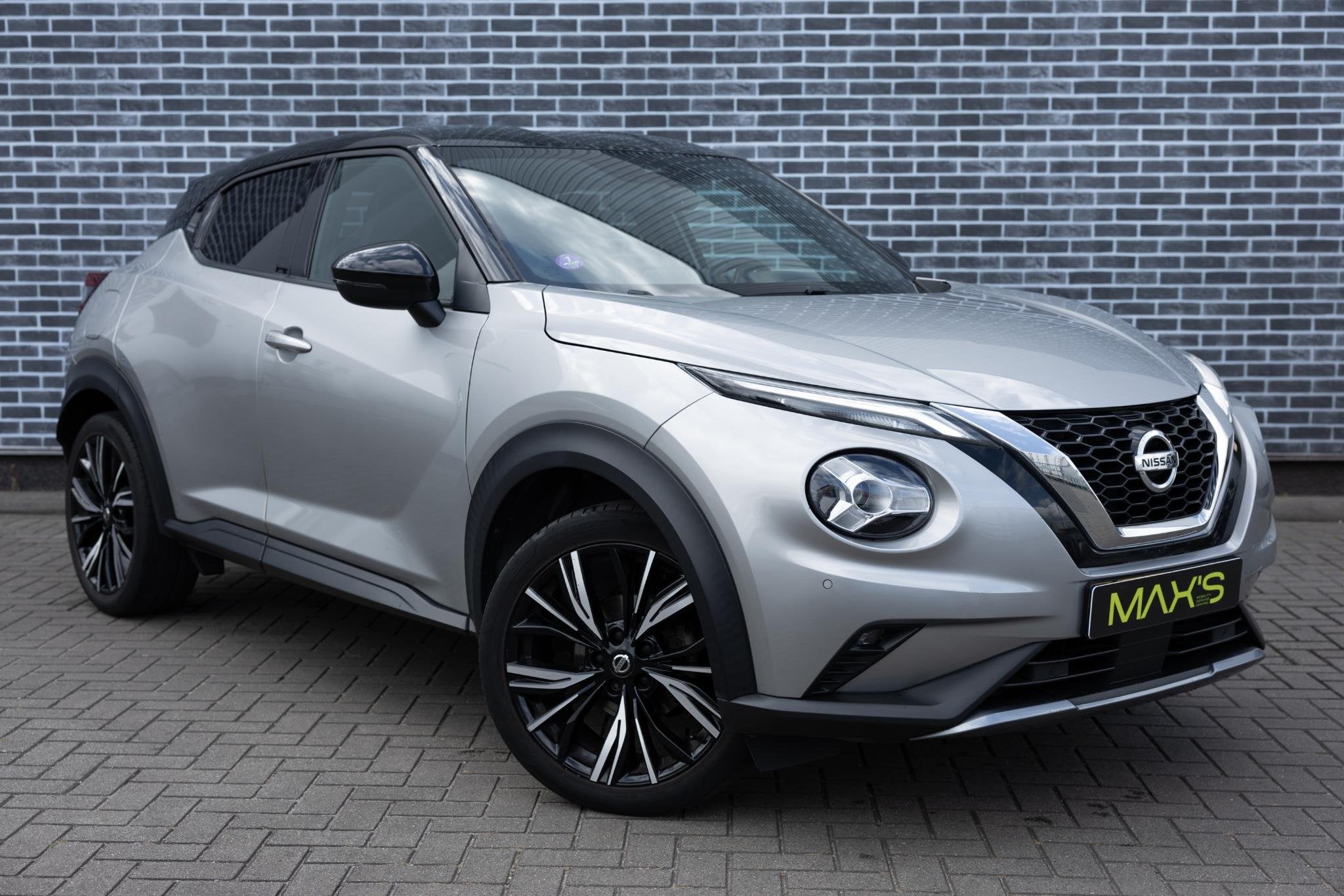 Nissan Juke 1.0 DIG-T 116 Premiere Edition | Two-Tone | Acht, Stof, Automatische klimaatregeling, Origineel Nederlands, Handgeschakeld