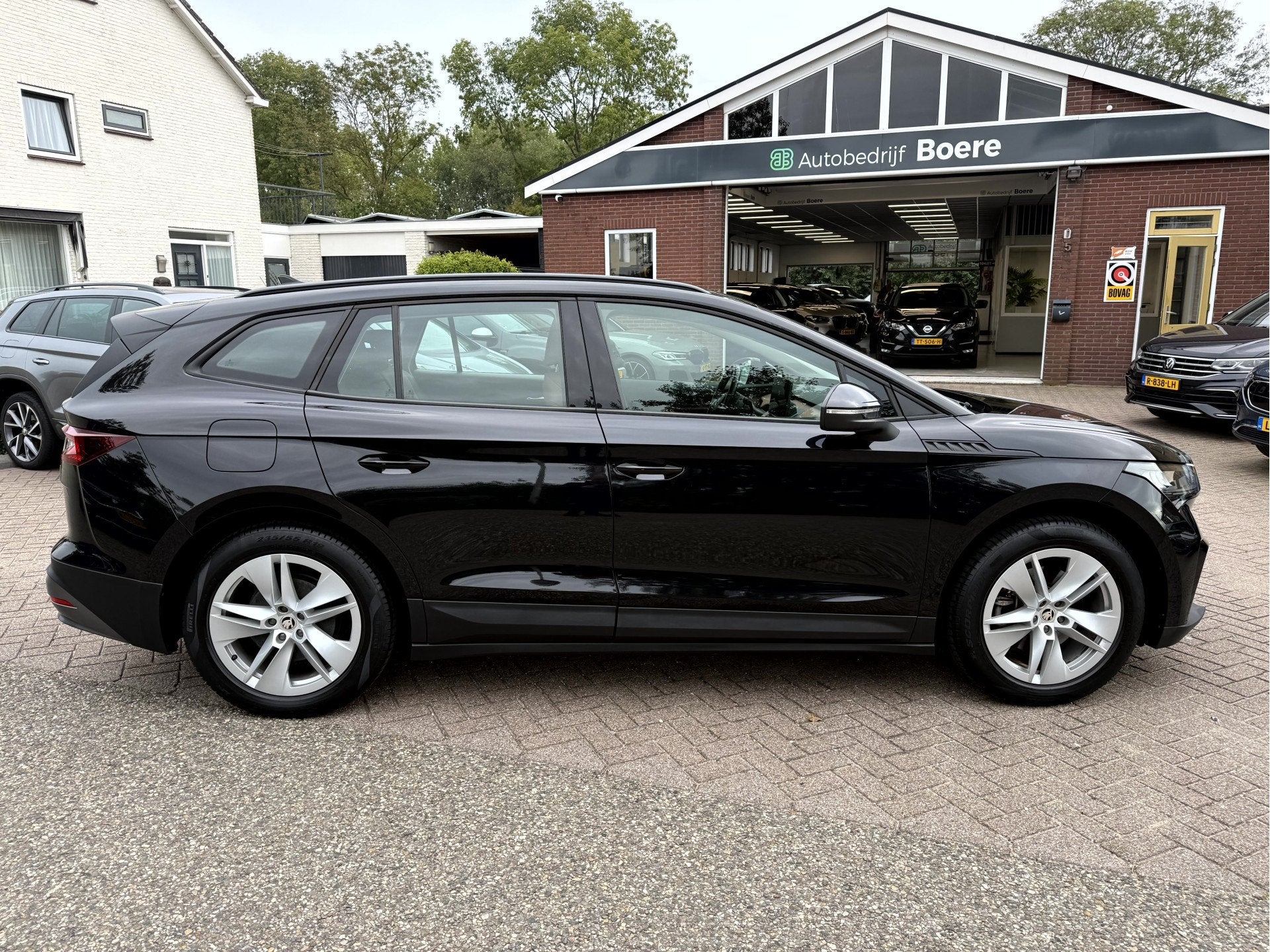 Skoda Enyaq iV 60 SOH 93.7%, Leer, Trekhaak Camera, Auto's, Automaat, 390 km, Achterwielaandrijving, Gebruikt
