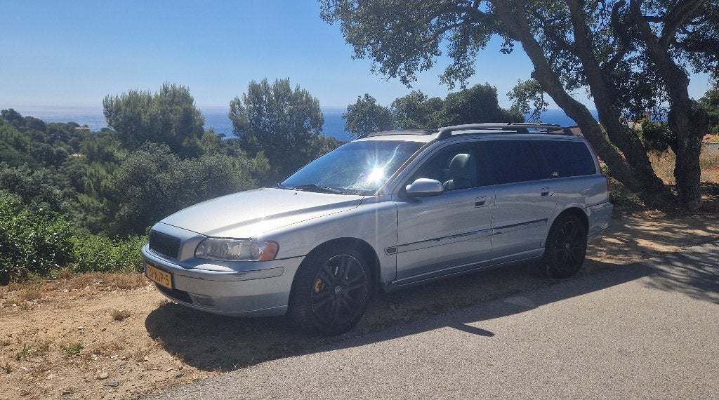 Unieke Volvo V70 Cabrio 2.4 170PK 2001 Zilver, nieuwe APK, Auto's, Volvo, Voorwielaandrijving, Lederen bekleding, 1800 kg, Beige