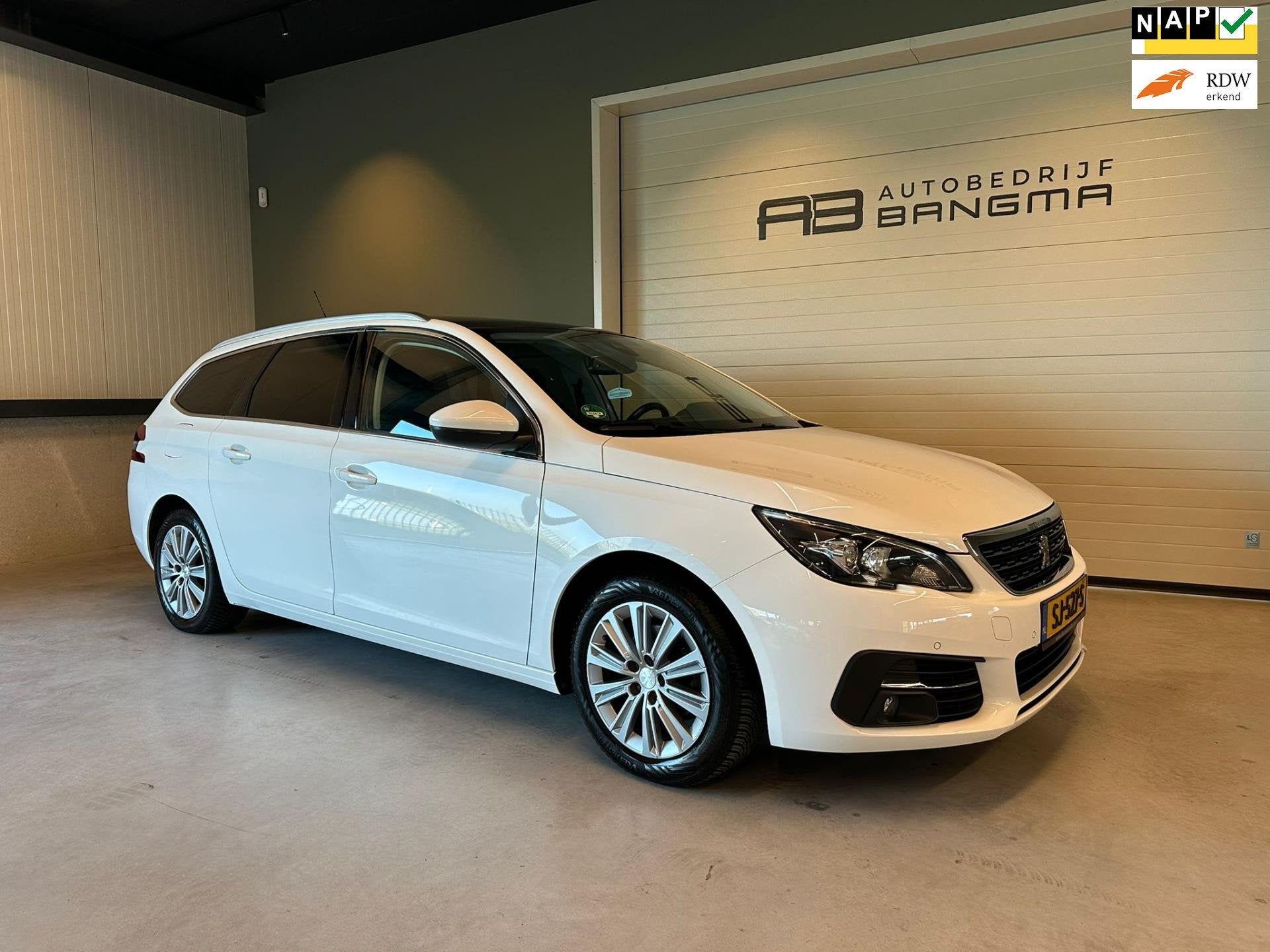 Peugeot 308 SW 1.2 PureTech BLUE LEASE PREMIUM|NAVIGATIE|CLI, Auto's, Voorwielaandrijving, Gebruikt, 1199 cc, Met garantie (alle)