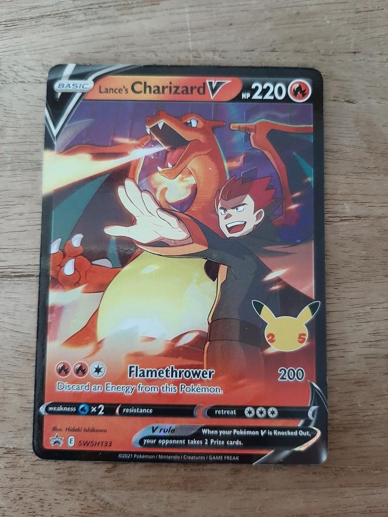 Lance's Charizard V Pokémon Kaart - Celebrations SWSH133, Ophalen, Zo goed als nieuw, Losse kaart, Foil