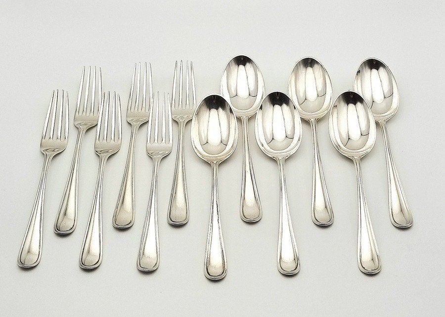 73. Zilveren lepels en vorken, Van Kempen, 1934