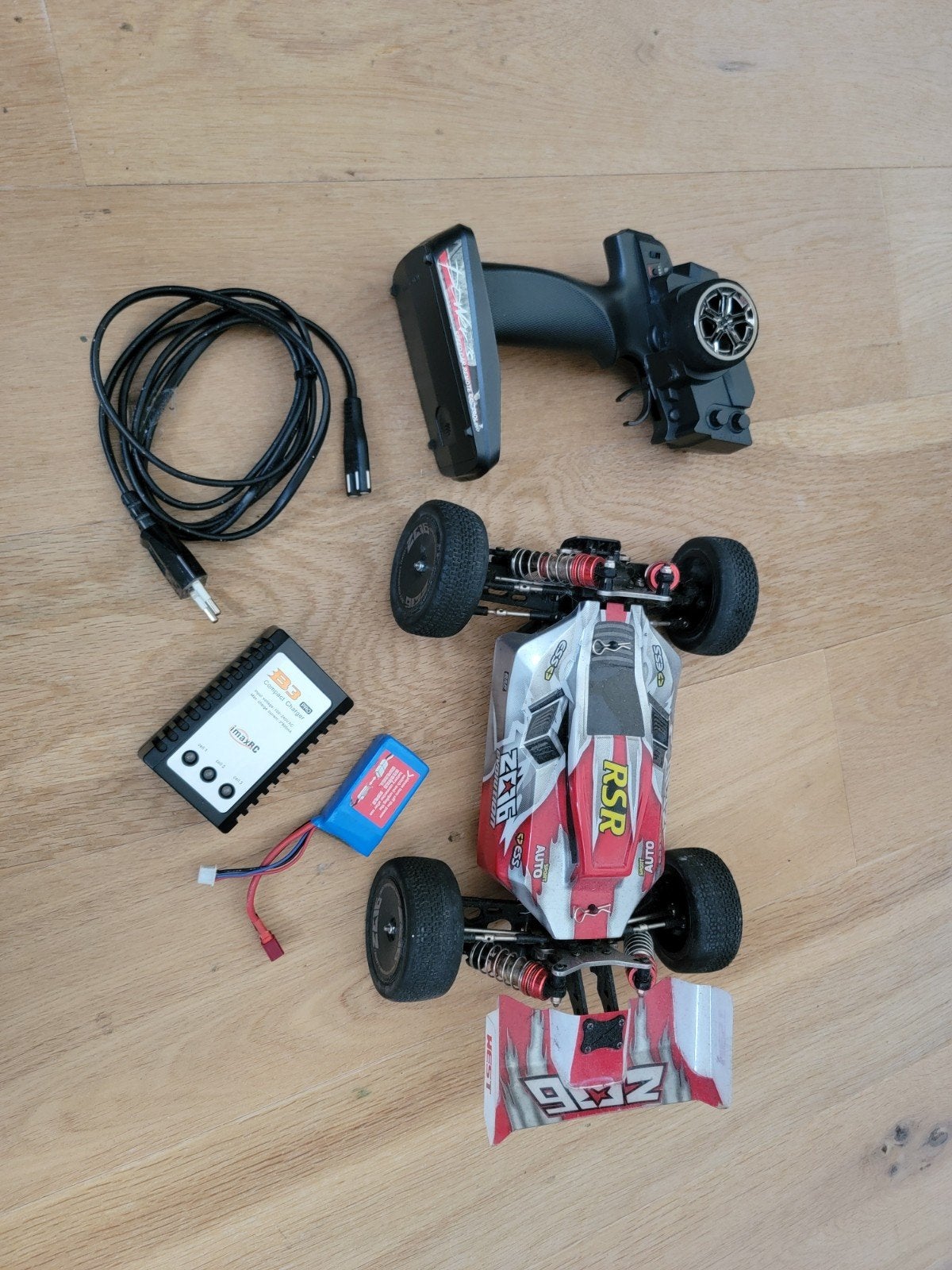 WLToys RC Auto 50km/u met zender, accu en lader, Elektro, Gebruikt, Auto offroad, Schaal 1:14