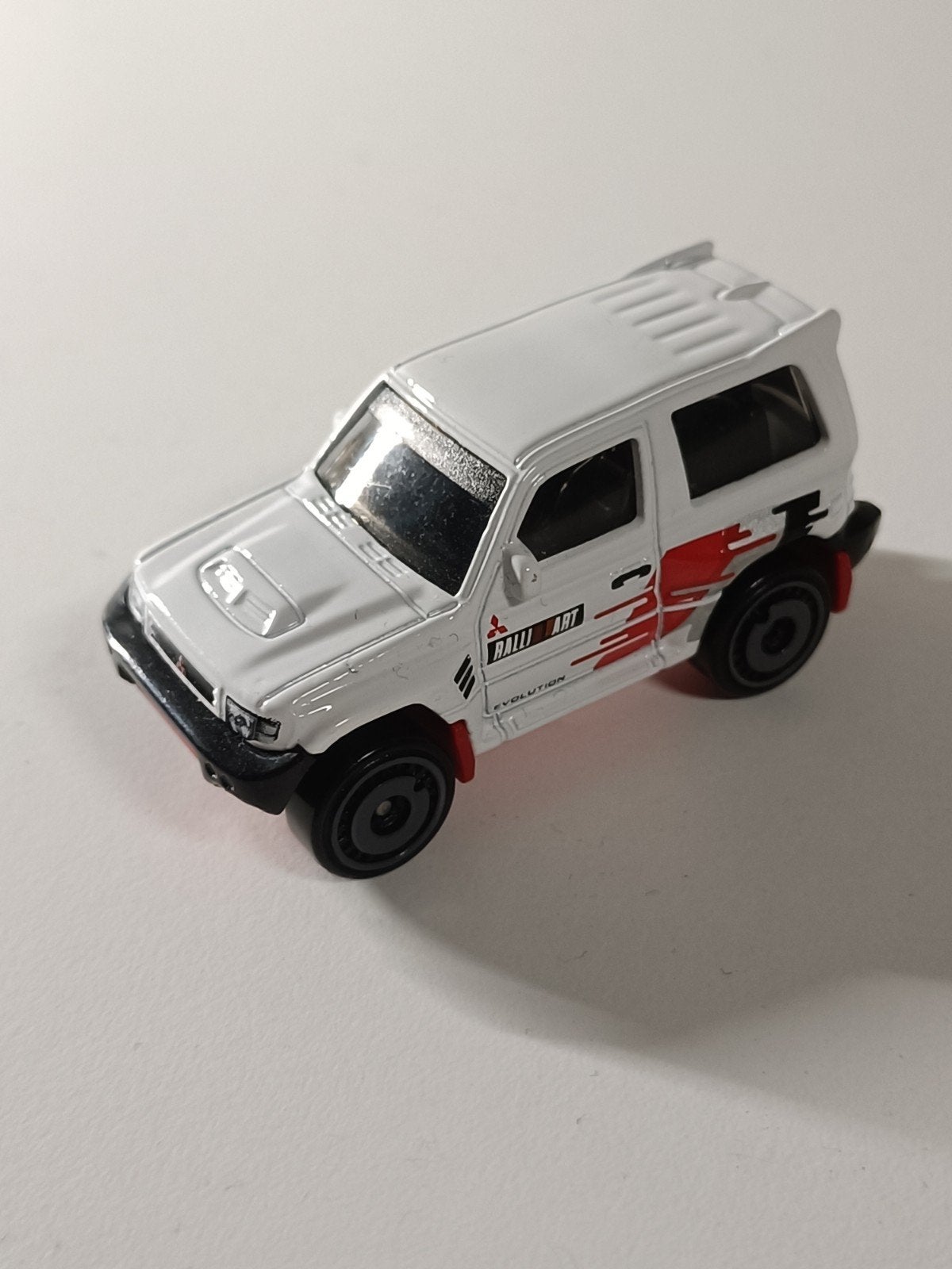 Hot Wheels Mitsubishi Pajero Evolution - Wit, Ophalen of Verzenden, Zo goed als nieuw, Overige typen