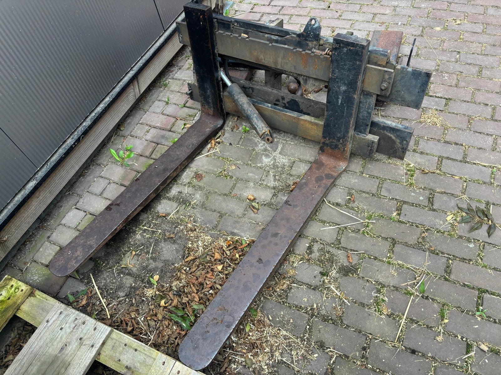 Palletbord met palletlepels, Ophalen