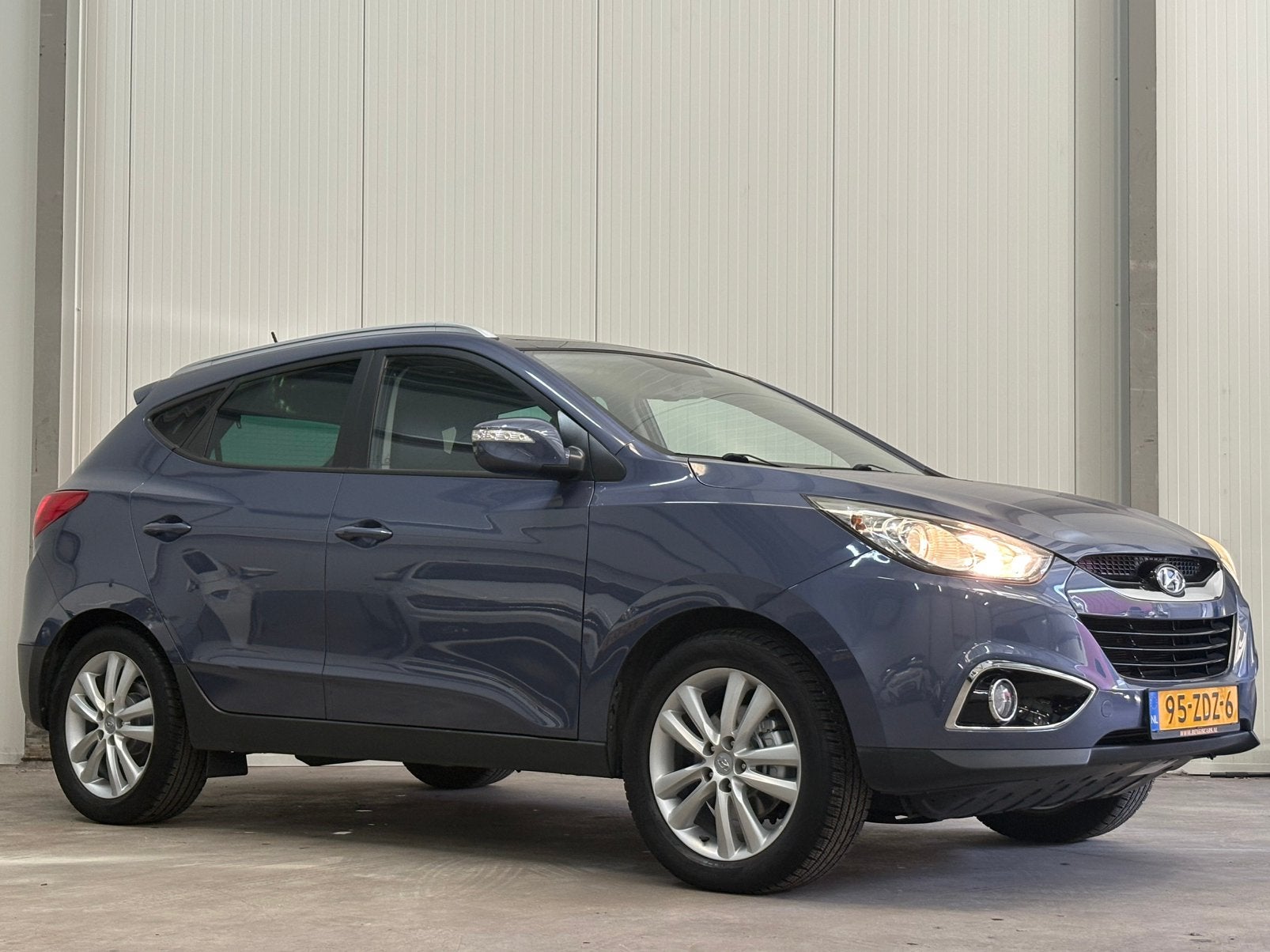 Hyundai iX35/2.0/Cvvt/4WD/PANO/NAVI/CAMARA/AUT/LEER/CRUISE/, Automaat, 1998 cc, 4 cilinders, Blauw