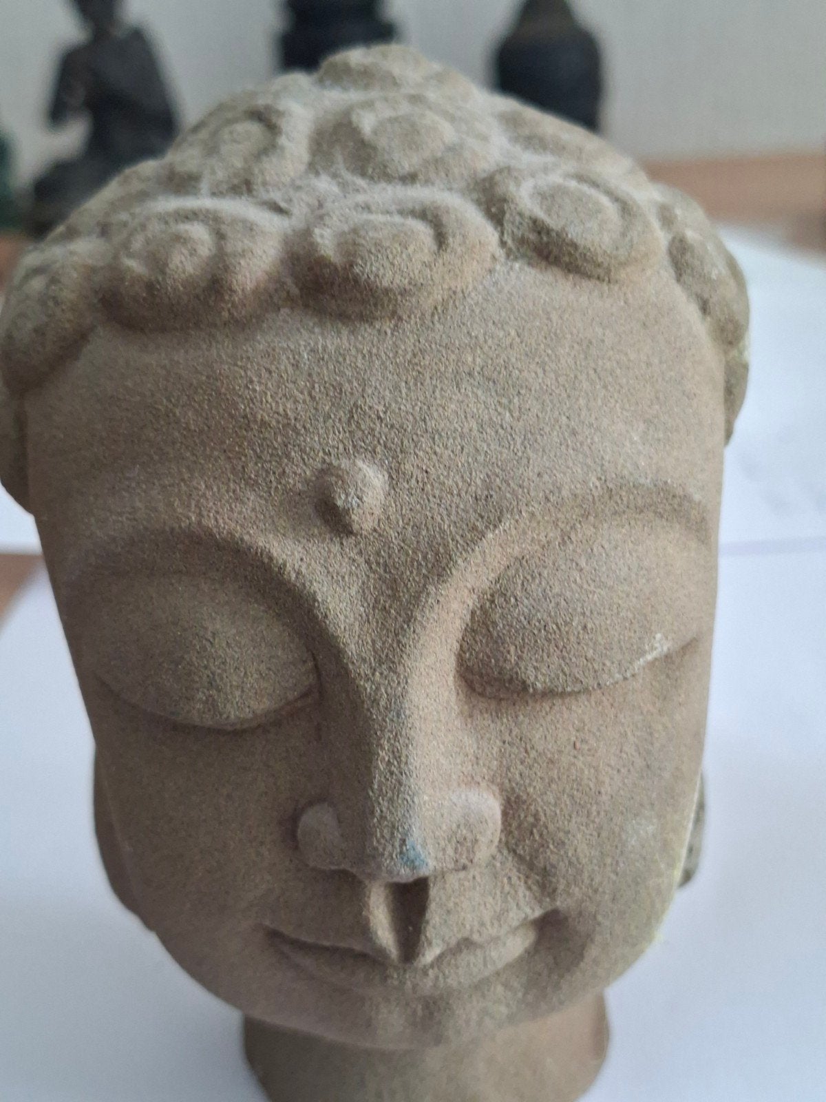 Hoofd Boeddha., Ophalen