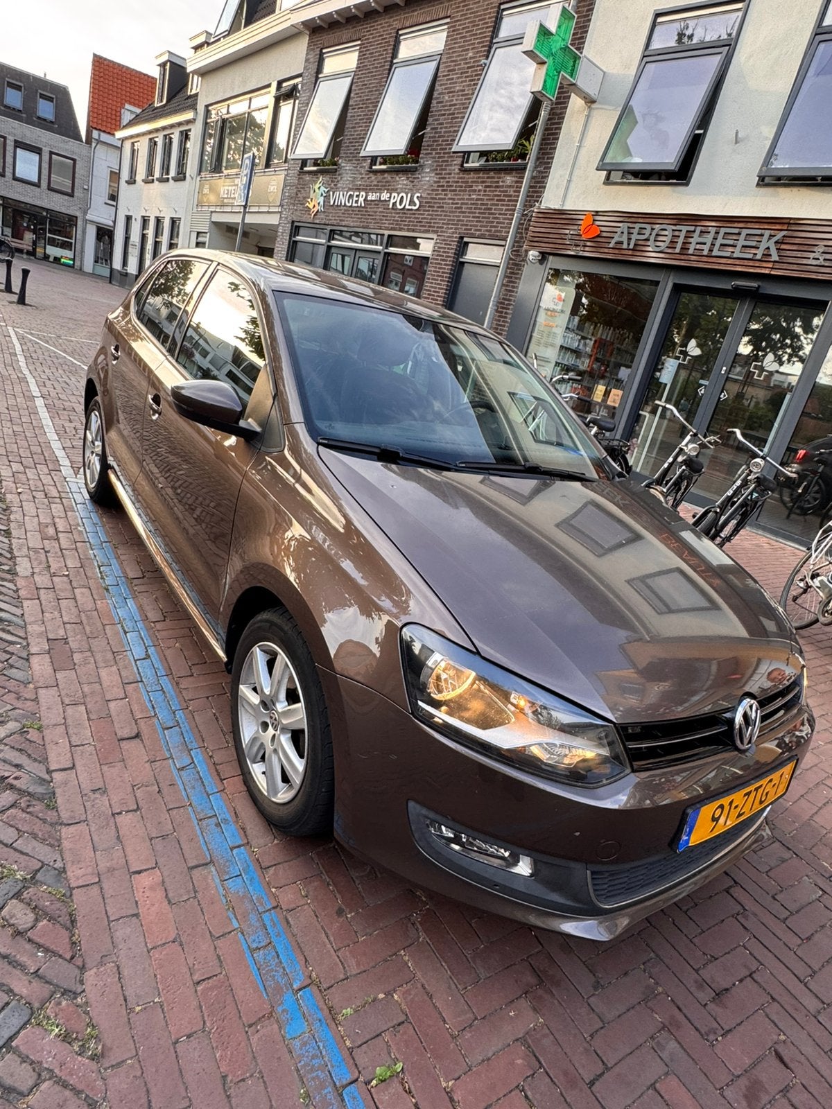 Volkswagen Polo 1.2 TSI 66KW 2013 Bruin, Auto's, Voorwielaandrijving, 4 cilinders, Bruin, Origineel Nederlands