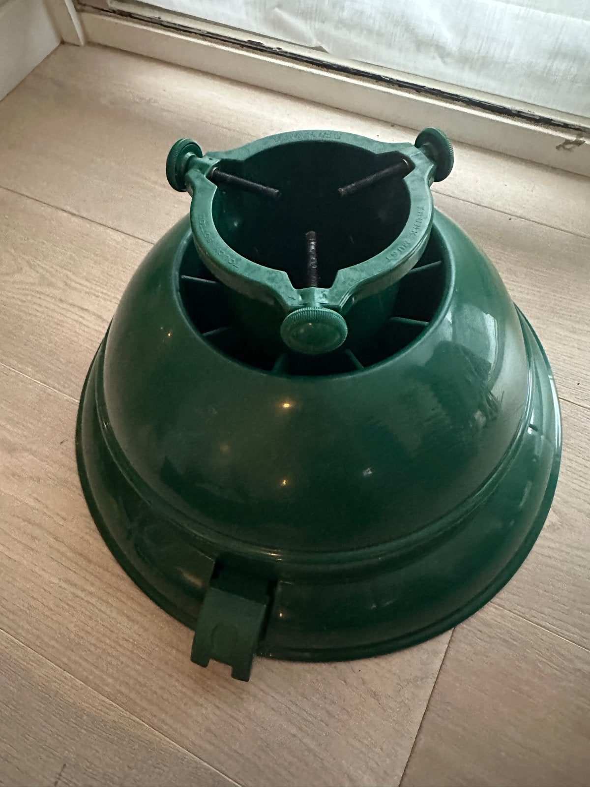 Kerstboomstandaard, Ophalen