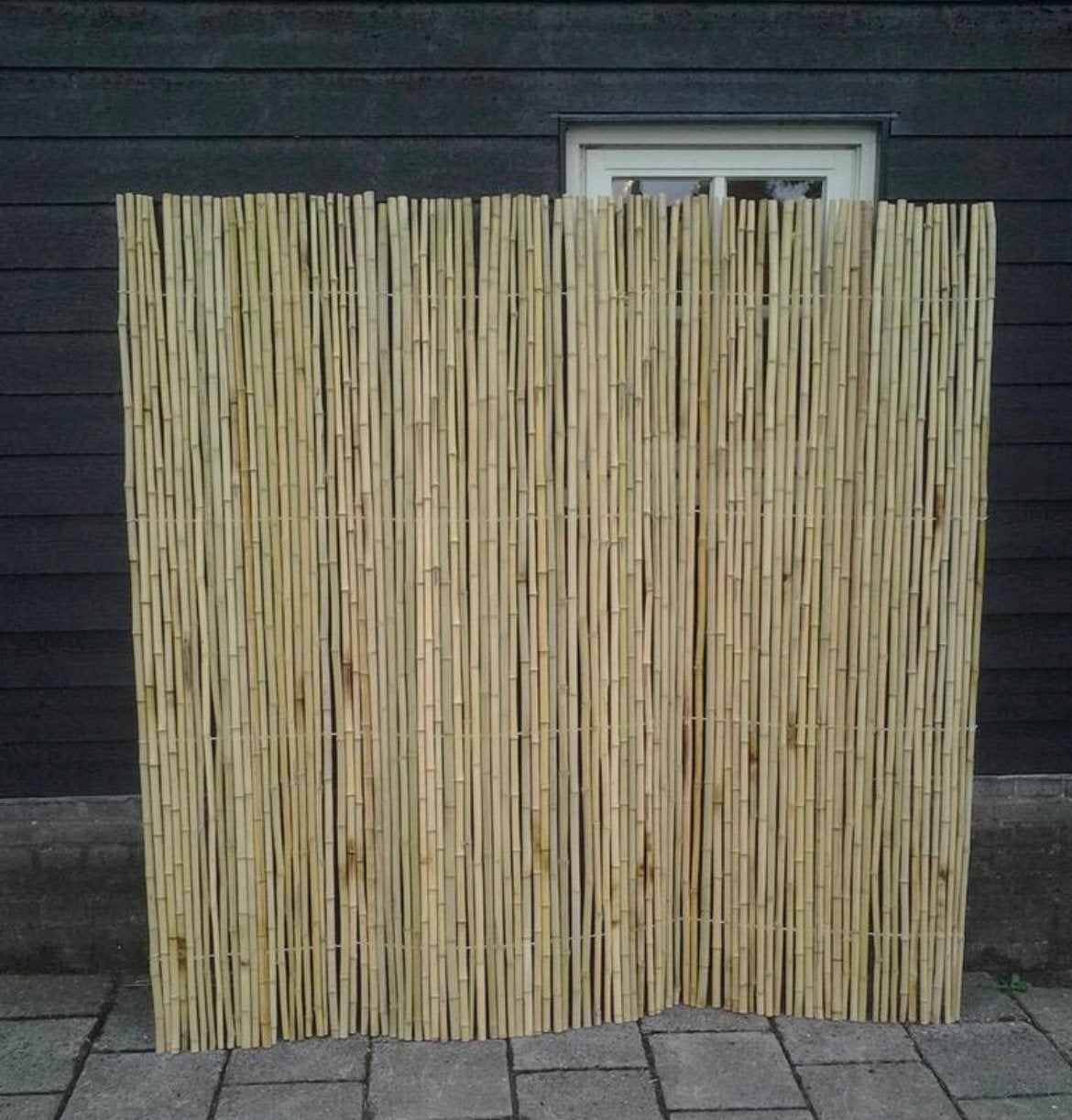 Schutting bamboe riet wilgenmat rietmat rietplaat palen