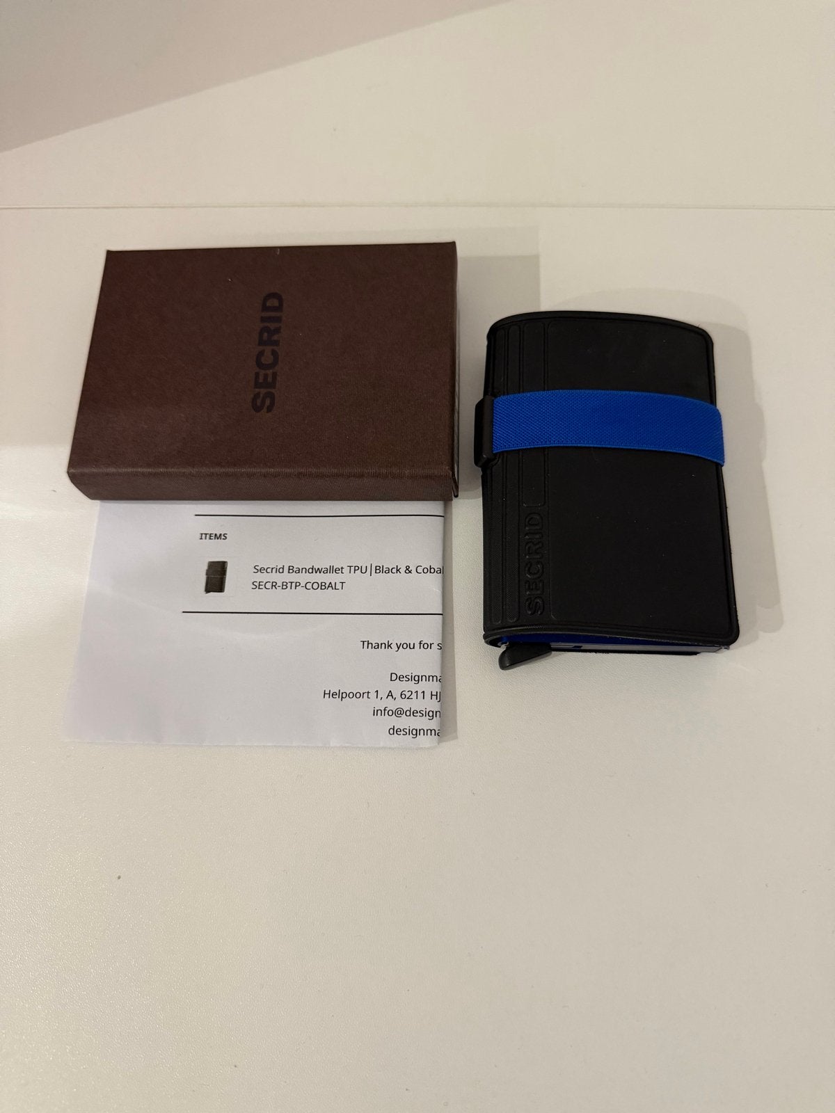 Secrid Pasjeshouder Zwart met Blauwe Band - Bandwallet TPU, Ophalen of Verzenden, Zo goed als nieuw, Zwart, Overige merken