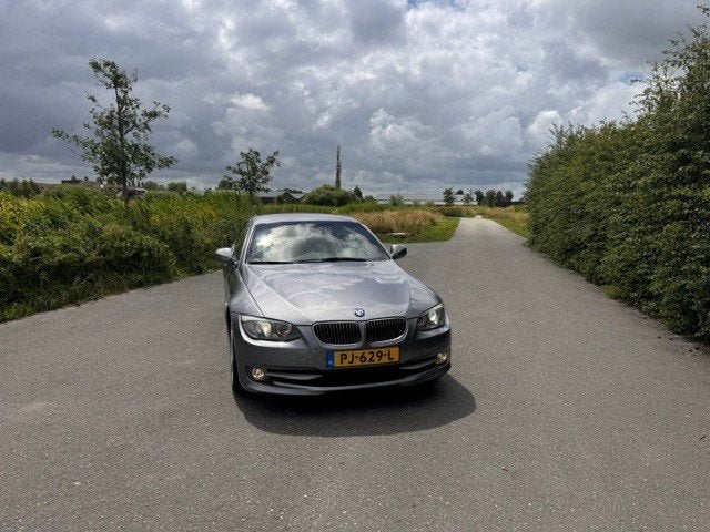 BMW 3-Serie 325 I Cabrio AUTOMAAT, Achterwielaandrijving, Zwart, Cabriolet, 4 stoelen