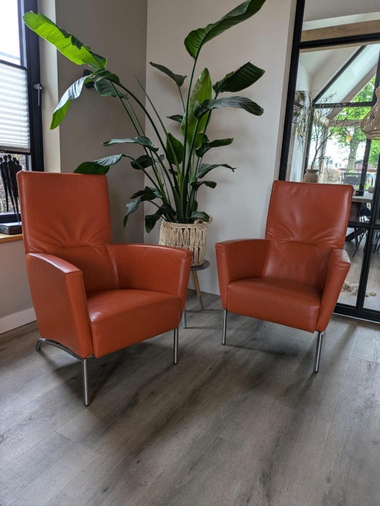 2 Design leren Fauteuils, Ophalen, Zo goed als nieuw, 50 tot 75 cm, Leer