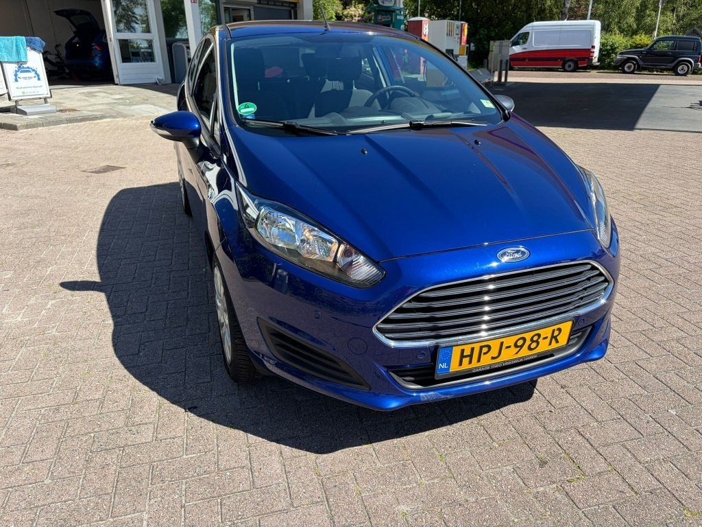 Ford Fiësta 1.25 60pk 3D 2014 Blauw, Auto's, Ford, Stof, 4 cilinders, Parkeersensor, Blauw