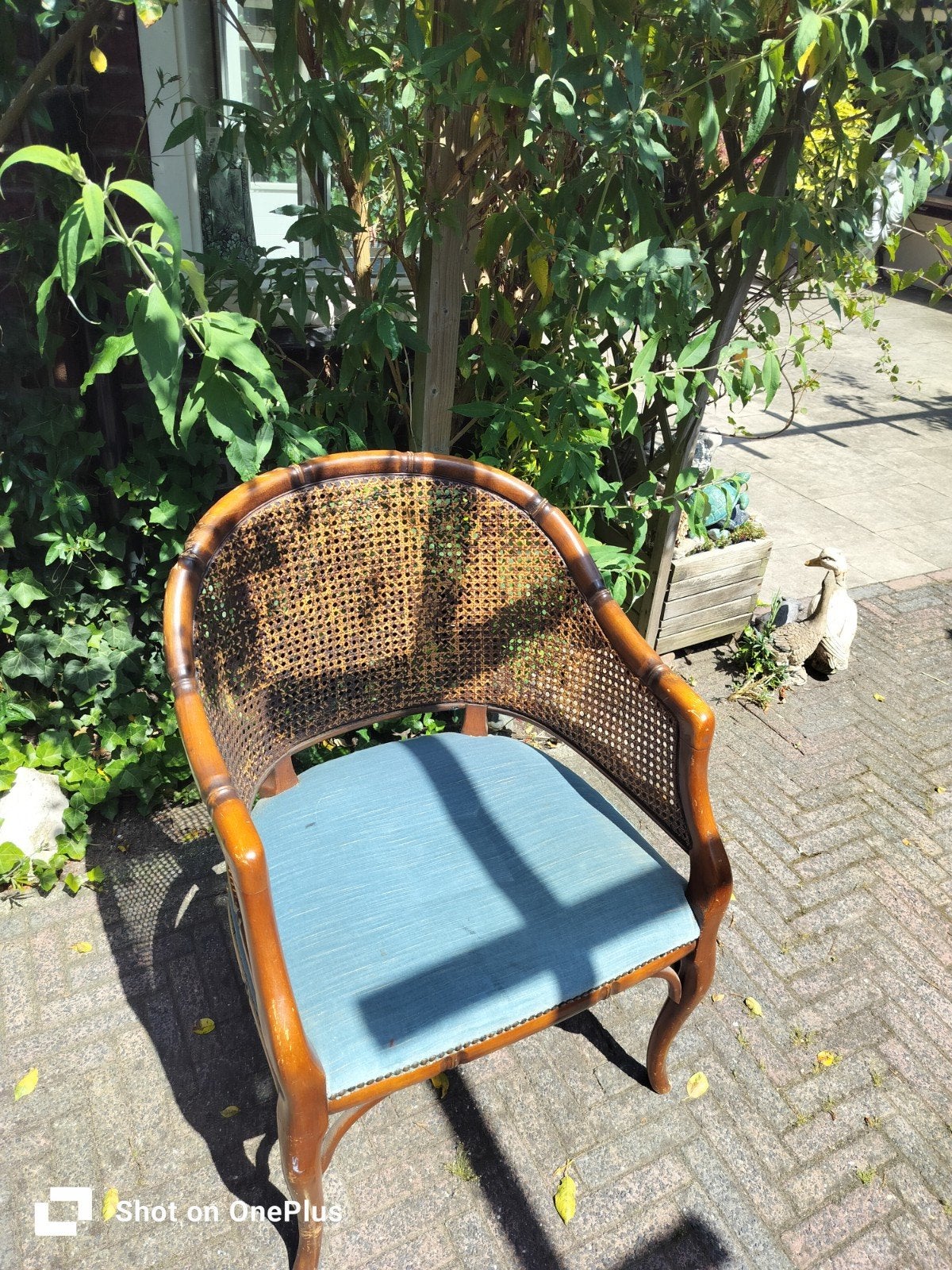 Vintage rotan stoel met blauwe bekleding, Antiek en Kunst, Ophalen of Verzenden